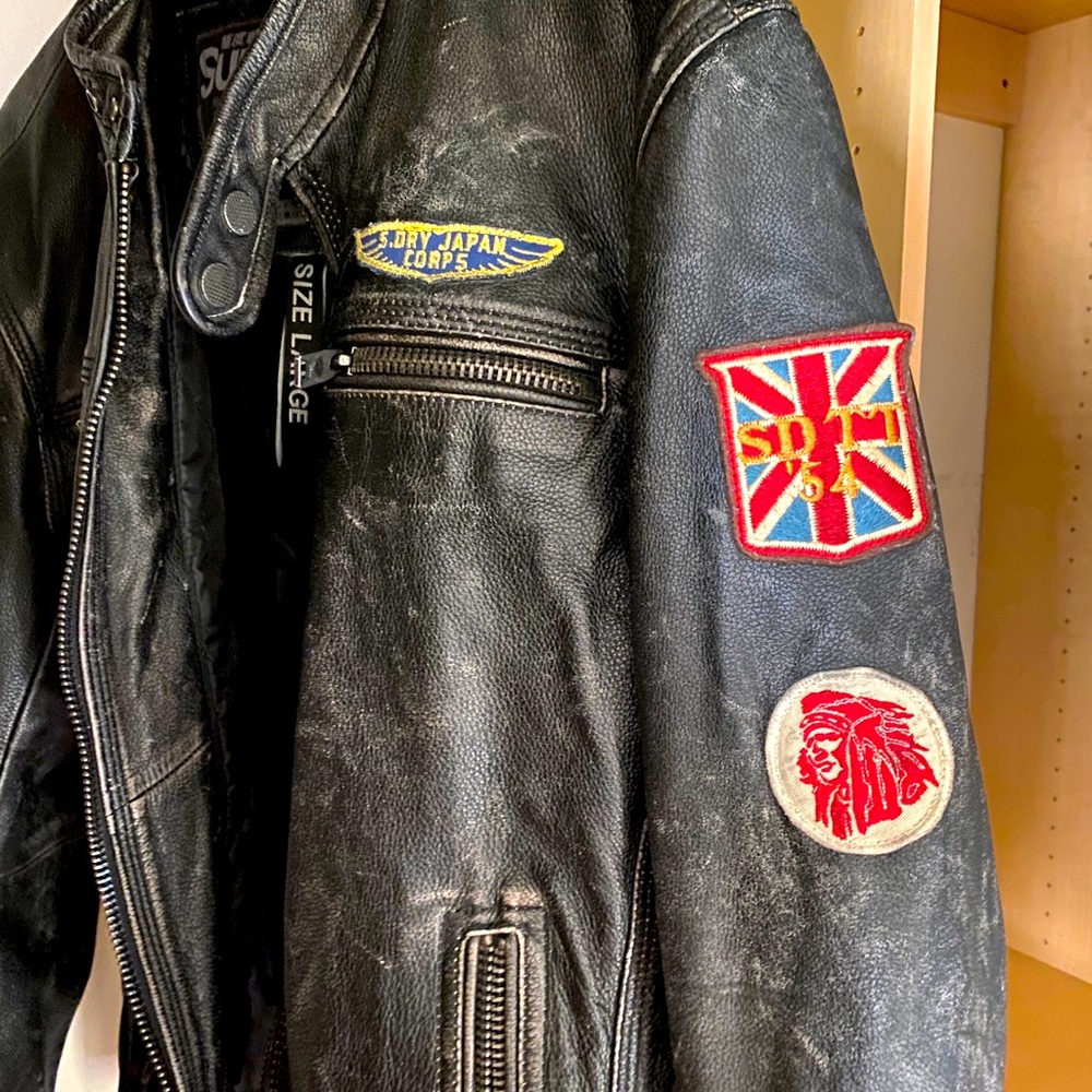 Superdry black distressed motorcycle jacket.